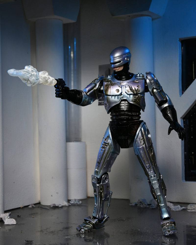 RoboCop Actionfigur Ultimate Battle Damaged RoboCop with Chair 18 cm - Preorder - ETA: 16.02.2026