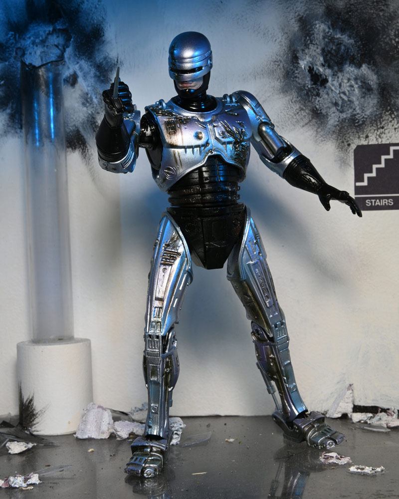 RoboCop Actionfigur Ultimate Battle Damaged RoboCop with Chair 18 cm - Preorder - ETA: 16.02.2026