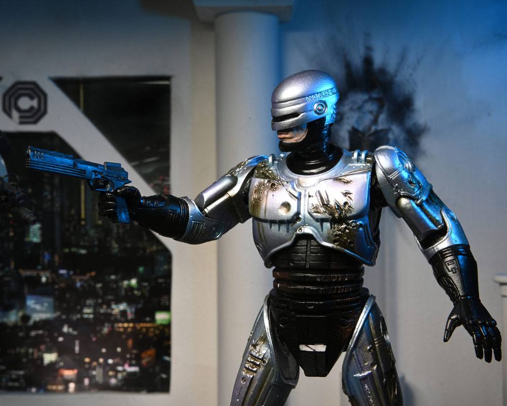 RoboCop Actionfigur Ultimate Battle Damaged RoboCop with Chair 18 cm - Preorder - ETA: 16.02.2026