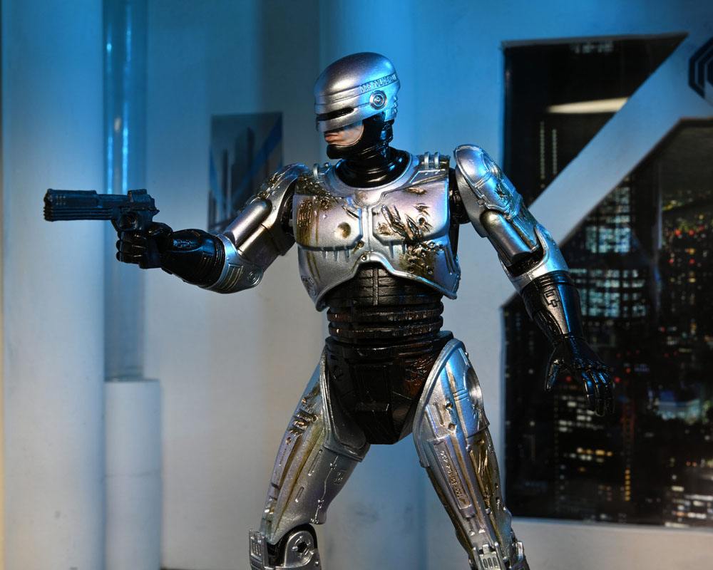 RoboCop Actionfigur Ultimate Battle Damaged RoboCop with Chair 18 cm - Preorder - ETA: 16.02.2026