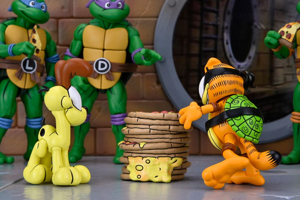 Teenage Mutant Ninja Turtles (Archie Comics) x Garfield 2er-Pack Actionfigur Ultimate Garfello & Odie 10 cm - Preorder - ETA: 24.04.2026