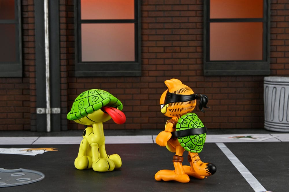 Teenage Mutant Ninja Turtles (Archie Comics) x Garfield 2er-Pack Actionfigur Ultimate Garfello & Odie 10 cm - Preorder - ETA: 24.04.2026