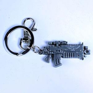 Warhammer 40K Metall-Schlüsselanhänger Bolter Metallic Finish - Preorder - ETA: 16.12.2026